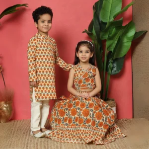 Twinning in Tangerine ? Orange Lehenga Choli & Floral Kurta Set